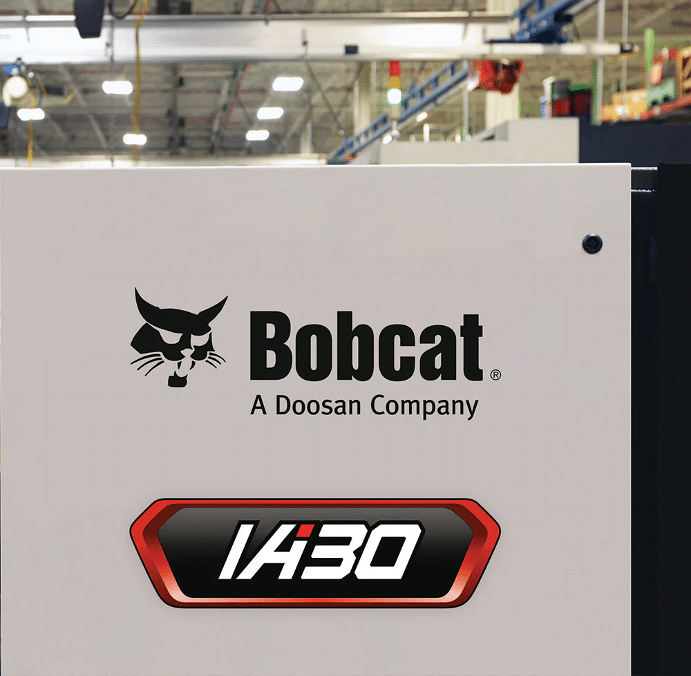 Close-up of a Bobcat industrial air compressor label showing the IA30 model badge and Bobcat logo, highlighting brand identity and equipment specification for commercial buyers
