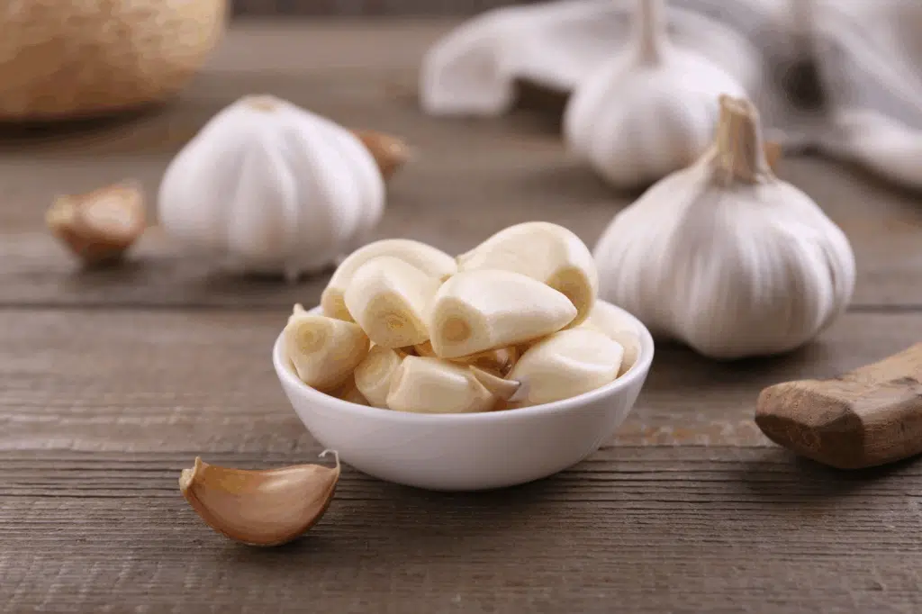 Cloves of garlic in a cup