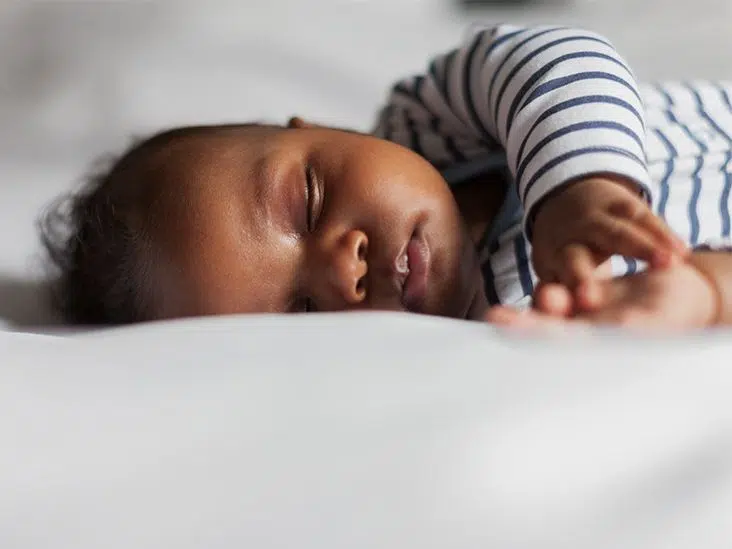 Baby sleeping in an elevated position
