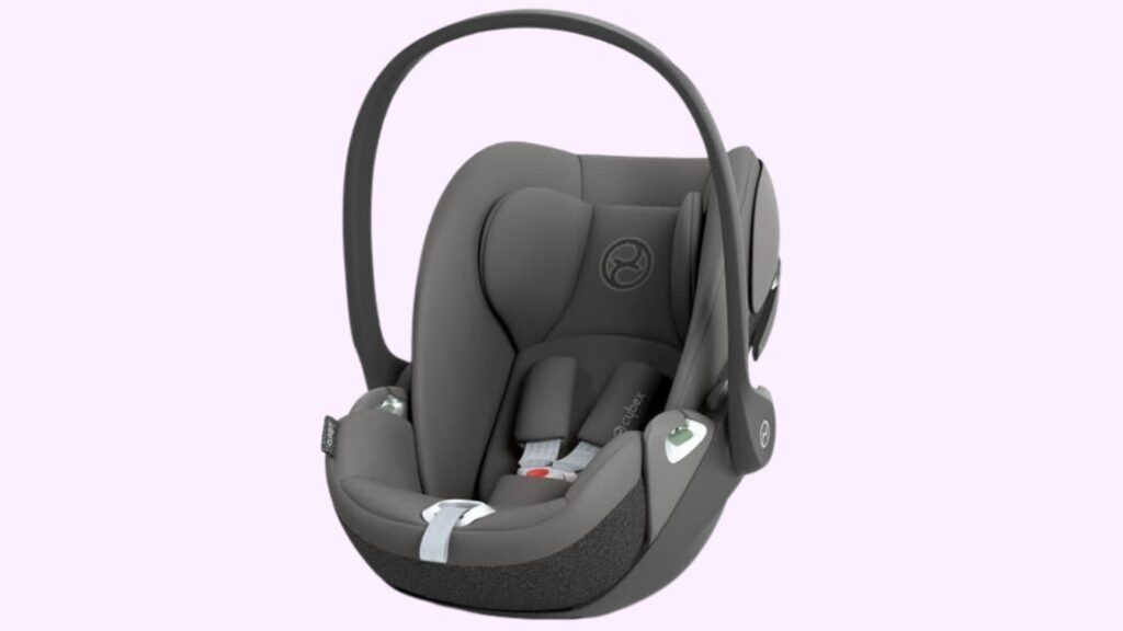 Cybex Cloud T infant car seat in dark gray with carry handle, padded headrest, and harness system, shown against a plain background
